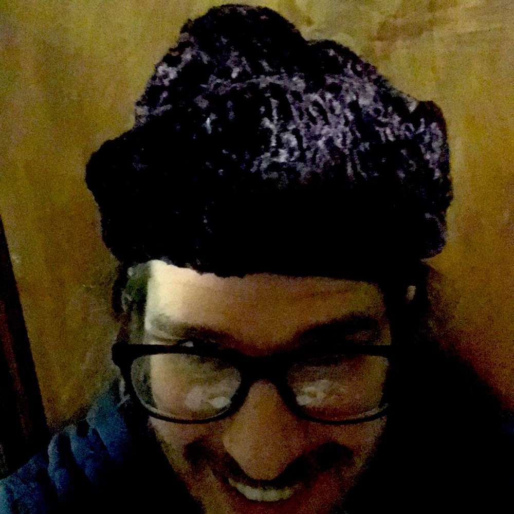 Fancy fake fur purple hat for a medium woman head.